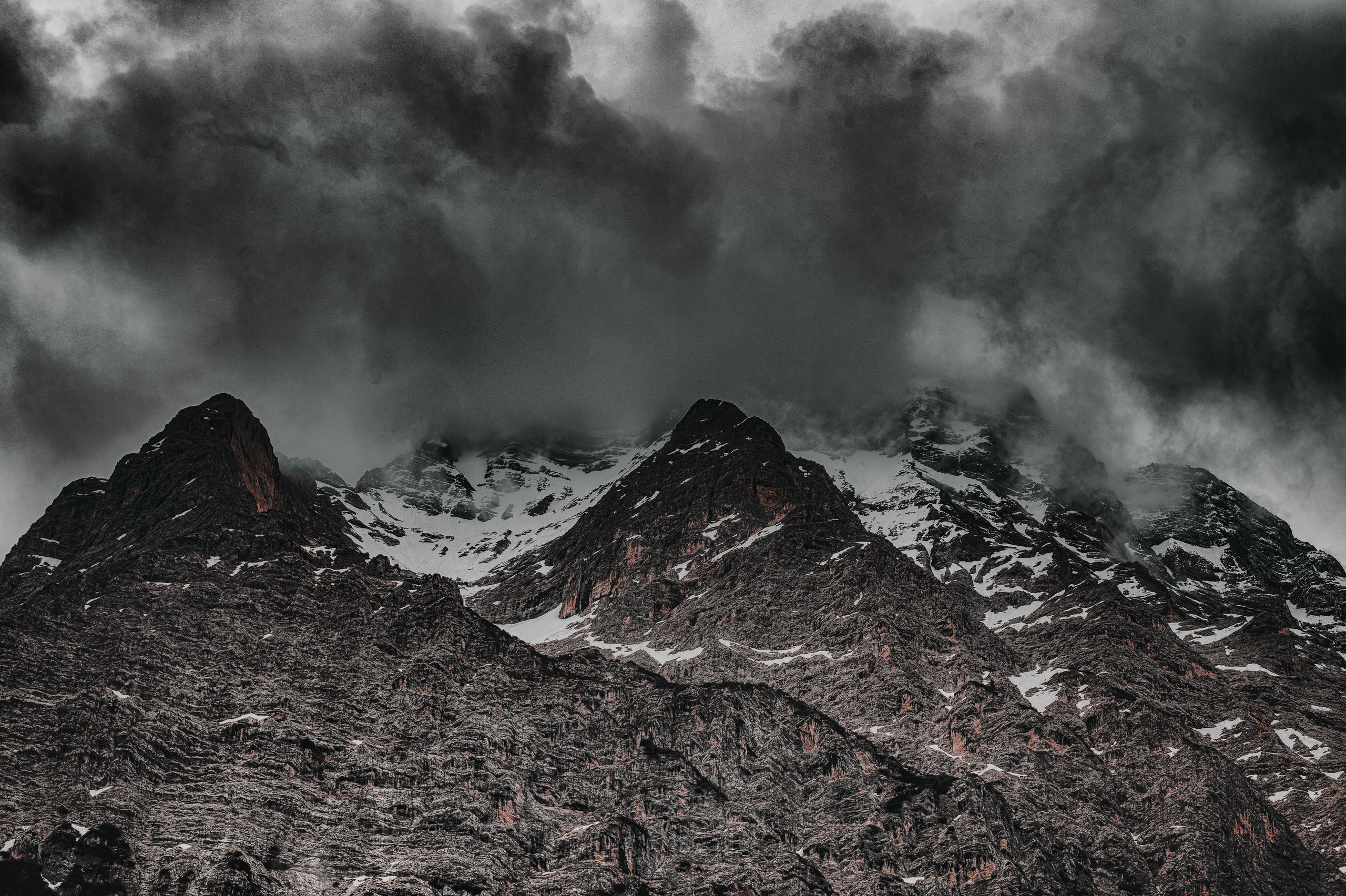 Dramatic mountain landscape with storm clouds
